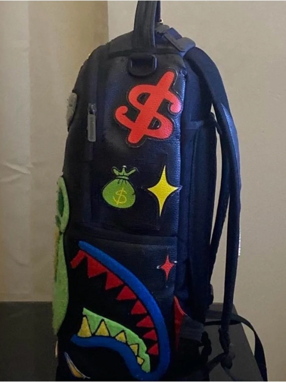 Black Backpack with Neon Green Bear Patch and Graphic Accents
